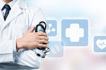 Young man doctor holding stethoscope