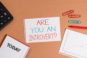 Writing note showing Are You An Introvertquestion. Business concept for demonstrating who tends to...