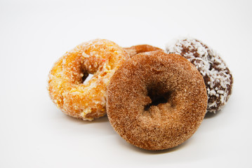 four assorted doughnuts isolated