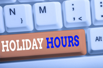 Word writing text Holiday Hours. Business photo showcasing employee receives twice their normal pay for all hours White pc keyboard with empty note paper above white background key copy space