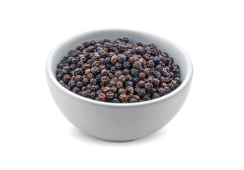 Black pepper on white background.