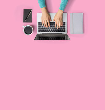 Person using a laptop computer from above