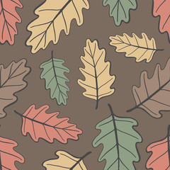 Seamless autumn pattern with colored oak leaves on a light background