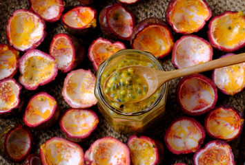 Close up juice jar from passion fruit or passiflora edulis on hard rind background