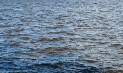Blue river water background with soft waves in Florida nature