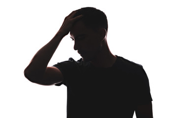 Silhouette portrait of Caucasian man thoughtful look, front view holding hand head, Homer pose...