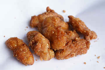 Banana fry in a pan with boiling oil. When finished, looks very appetizing