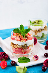 Vegan dessert with granola, ricotta cheese and strawberries with copy space
