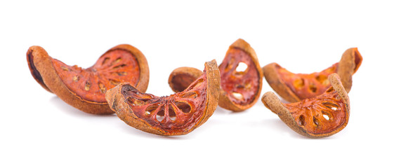dried quince slices on a white background