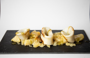 Spanish squid top with potatoes