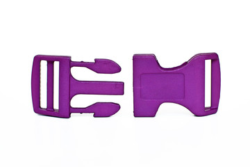 Single opened purple quick side release plastic buckle isolated on white background