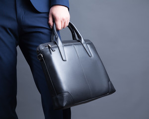 Businessman with briefcase in hand.
