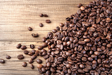 Fototapeta na wymiar Roasted coffee beans background. Organic coffee. Close Up.