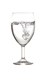 Half water in wine glasses . Isolated on white