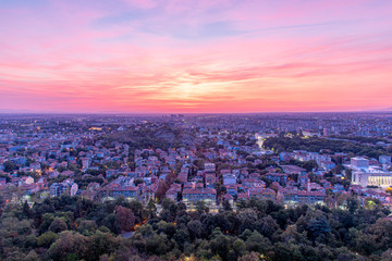 Beautiful sunrise with pink and yellow clouds above Plovdiv city 