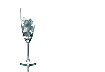 Glass with ice cubes, isolated on white