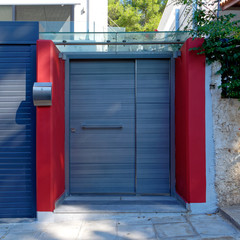 red and grey modern house entrance external door, Athens Greece