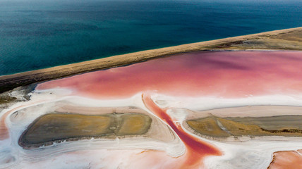 Amazing drone panoramic aerial landscape of beautiful salt plains. pink  lake. Bright red salt...
