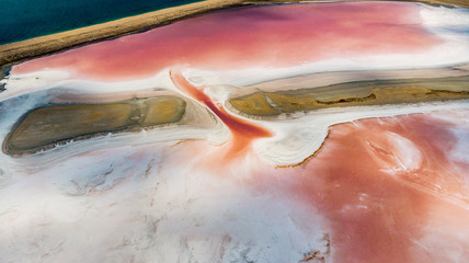 Amazing drone panoramic aerial landscape of beautiful salt plains. pink  lake. Bright red salt...