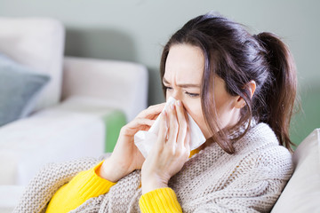 Portrait of ill woman caught cold