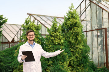 Portrait of male agricultural engineer outdoors