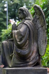 Obraz premium Sculpture of Angel at a Prague cemetery. Czech Republic. Sculpture elements.