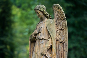 Obraz premium Sculpture of Angel at a Prague cemetery. Czech Republic. Sculpture elements.