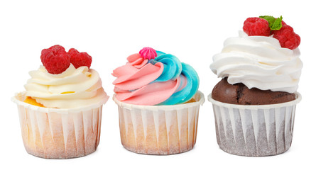 Three yummy cupcakes with icing  isolated on white background