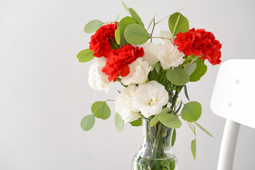 Obraz premium Bouquet of beautiful flowers on light background