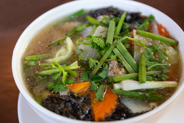 Clear soup with seaweed and minced pork.