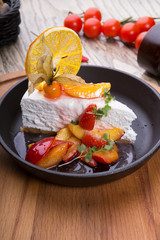 Slice of cheese cake decorated with berries