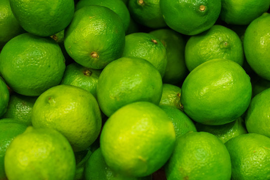 Fruits of green ripe lime in the shop