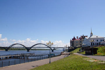 Fototapeta premium reinforced concrete arched road bridge over the Volga river in Rybinsk.