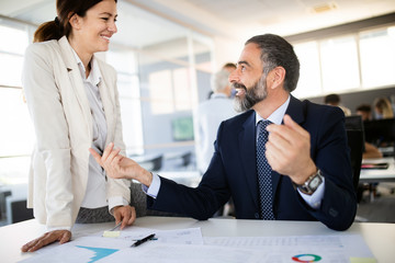 Portrait of architects having discussion in office