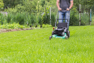Man with lawn mower