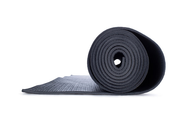 Close Up Studio Shot Of Rolled Op Yoga Mat, Side View. Isolated On White Background.