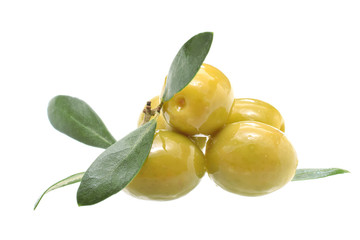 Green marinated olives ready to eat with branch with leaves closed up isolated on white