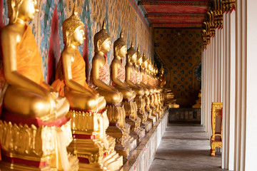 Fototapeta premium Ancient Buddha's statue at Wat Pho Temple, Bangkok, Thailand.