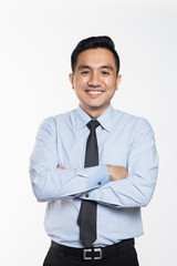 Asian man with arms crossed smiling