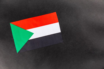 sudan flag on a black background
