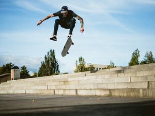 Skateboarder doing a trick on the skateboard