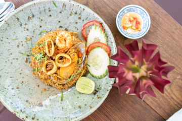 Spicy fried rice with herb and seafood (tom yum fried rice),thai food concept