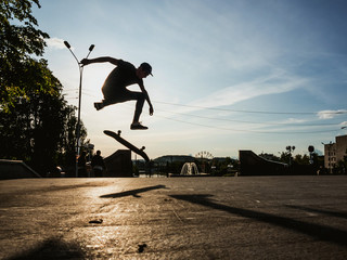 Skateboarder doing a trick on the skateboard