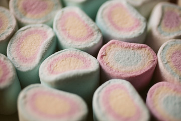 Obraz na płótnie Canvas Colorful marshmallows candy close up view as texture and background. 