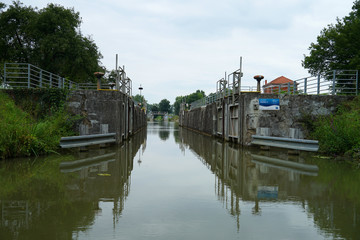 Fototapeta na wymiar Bata Canal lock on the Morava River used for transportation and recreation, Czech Republic