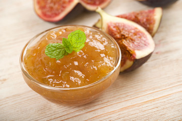 figs jam on a wooden background