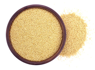 Amaranth grain in ceramic bowl isolated on a white background.