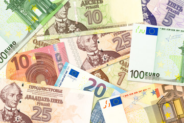 Fototapeta na wymiar some transnistrian ruble banknotes and euro banknotes mixed indicating bilateral economic relations