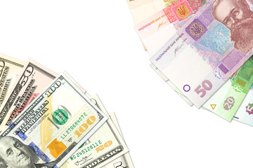 some ukrainian hryvnia banknotes and american dollar banknotes indicating bilateral economic relations with copyspace