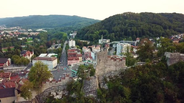 4K scenic aerial view of a castle ruin  in a city at sunset. aerial view of ruins of stein castle, ruine stein in baden switzerland